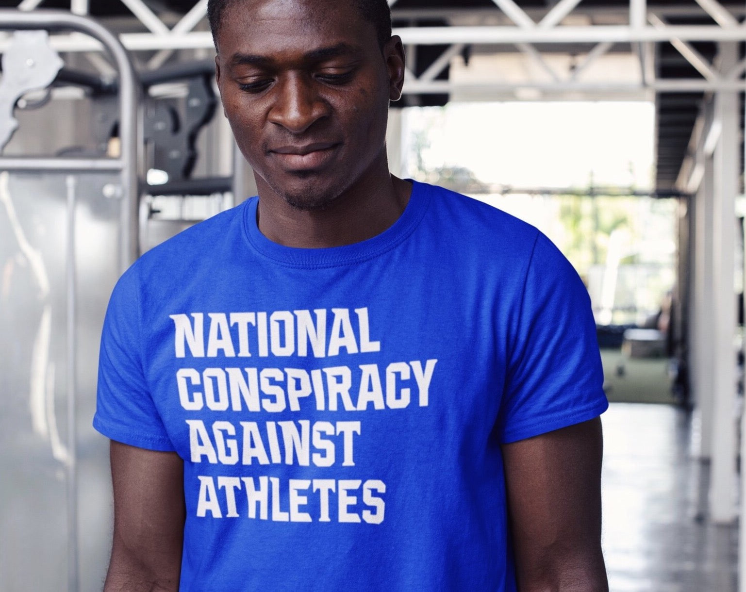 “National Conspiracy Against Athletes” T-shirt